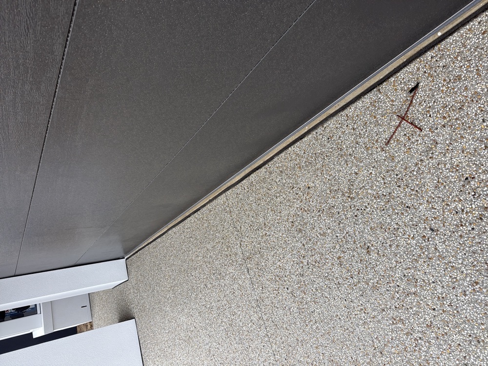 Slab to driveway joint not sealed, found during a pre-handover inspection in Clyde