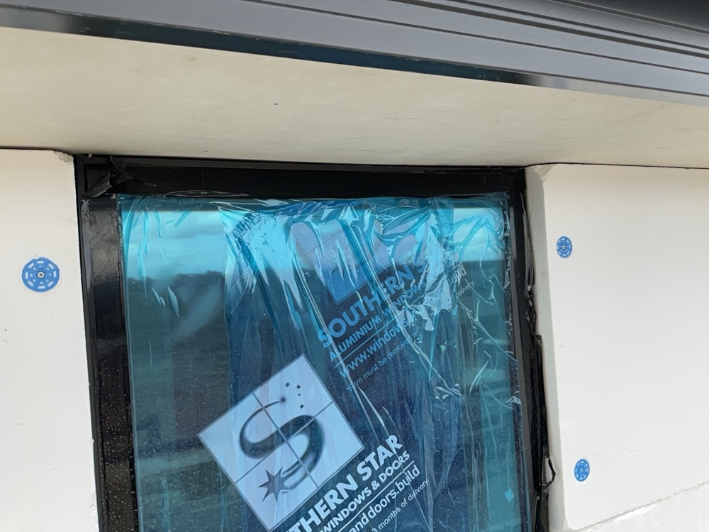 Window head and side infills incomplete, found during a fixing inspection in Clyde