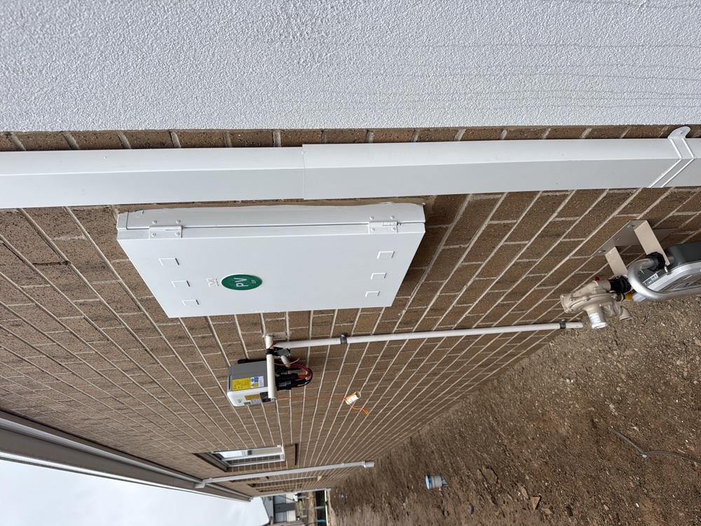Meter box installed out of plumb, noted for the builder to correct, found during a pre-handover inspection in Clyde