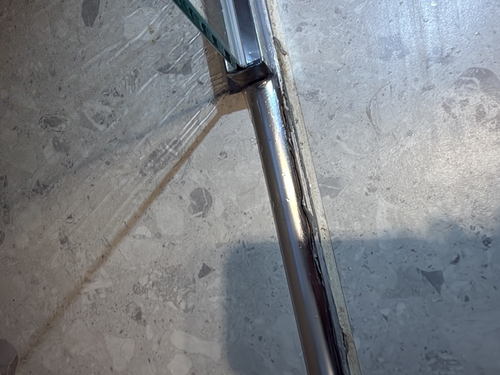 Finish around the shower water stop angle inconsistent, Clyde